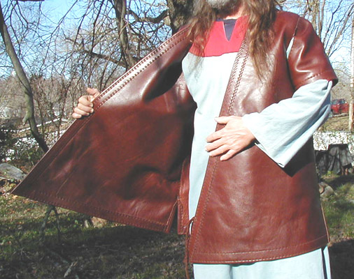 The inner layer of our Viking Age Gambeson faces the grain side of the leather outward. The same high quality leather is used on both inside and outside layers.