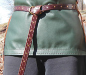 A 1 x 60 Incised and Studded Belt shown in Dark Brown and Brass.