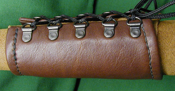 Soft Leather Bracers shown in brown leather with black hand stitching. Excellent comfort.