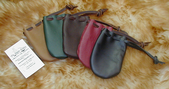 Drawstring Coin Pouches shown in Tan, Brown, Green, Brick & Black.
