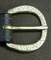 Our Medieval Sword Belt Buckle is solid brass, hand-worked in a classic Medieval Zig Zag & Dot Pattern.