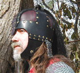 Side view of our leather Anglo-Saxon Helm. Shown in black with dark brown plates.
