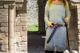 Our Sir Robert Swordbelt is based on the sword belt of Sir Robert de Bures. Shown front view in dark brown leather with nickel hardware.